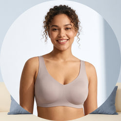 Circular portrait of a young woman, Chloe Miller, smiling genuinely while wearing a comfortable, neutral-colored, wirefree fu